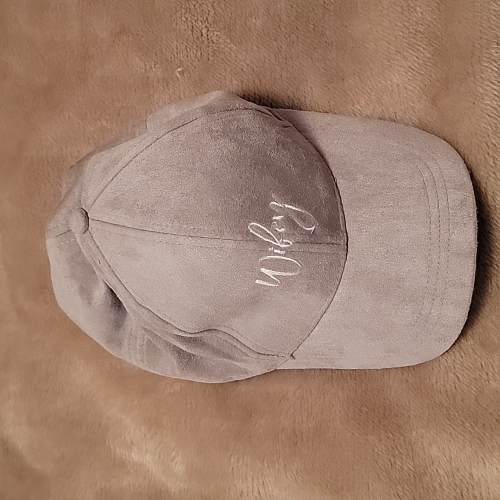 Gray hat with wifey written on it.